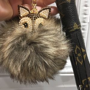 sold out. Louis Vuitton FOXY tassel keychain.